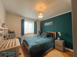 Bedroom One- click for photo gallery